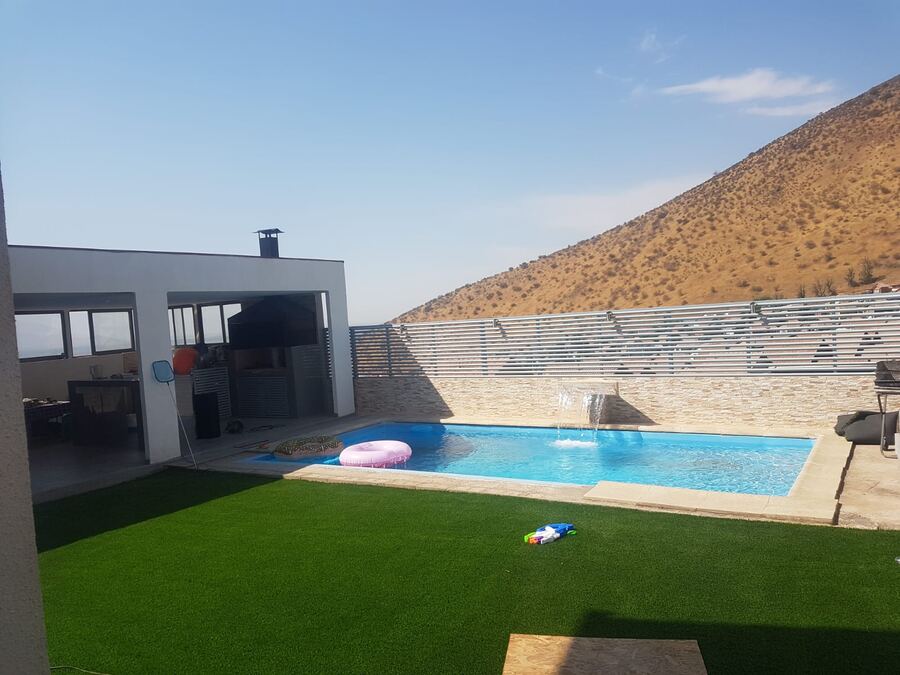 Después: terraza y piscina terminada